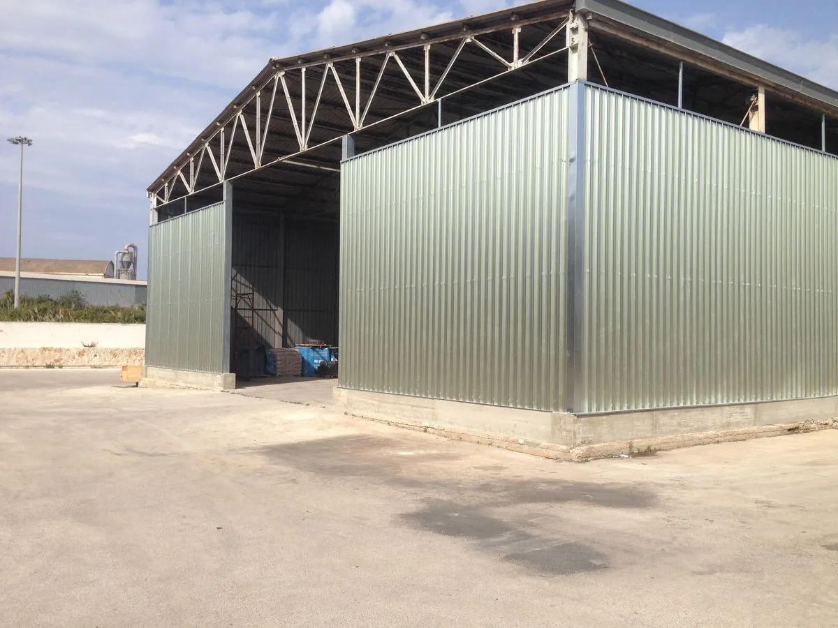 ما أفضل تصاميم هناجر السيارات في العقيق؟