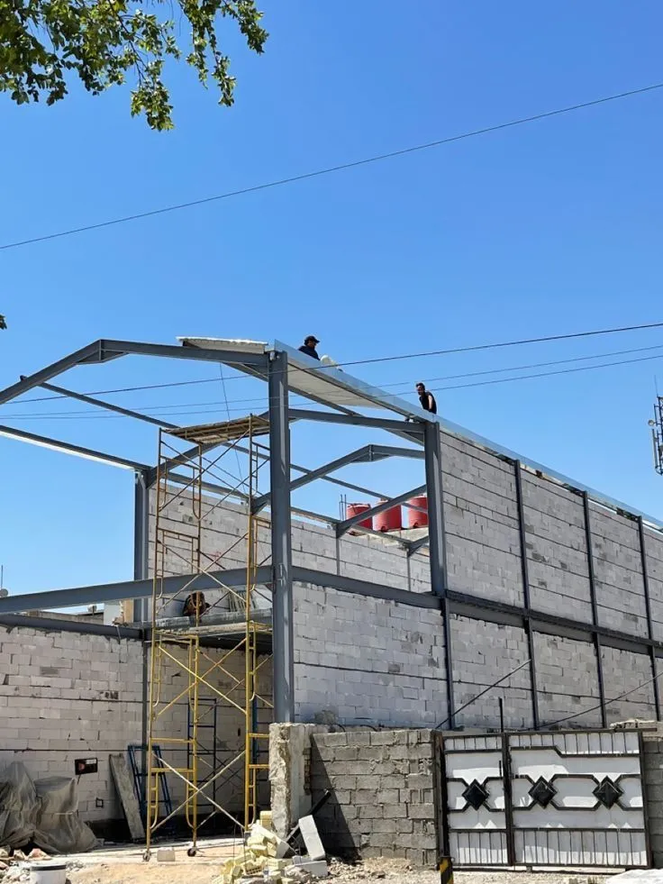 ما أفضل تصاميم هناجر السيارات في العقيق؟